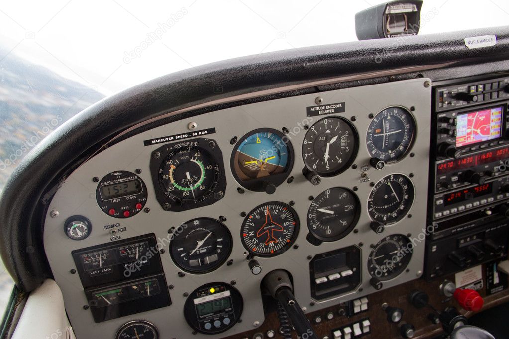Pilot View of Complex Instrument Panel of Airplane