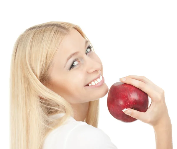 Vacker kvinna bita ett rött äpple — Stockfoto