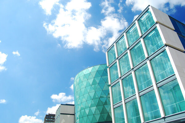 Corporate buildings on a blue cloudy sky in Leeds, UK