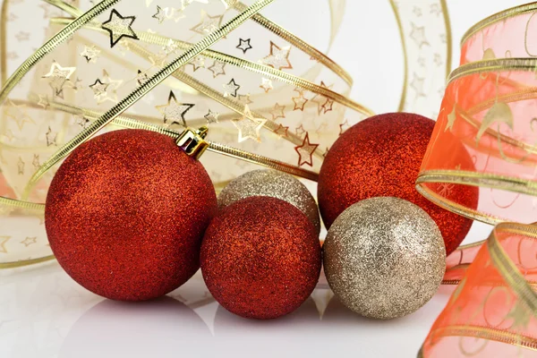 Gold and red Christmas baubles. Stock Picture
