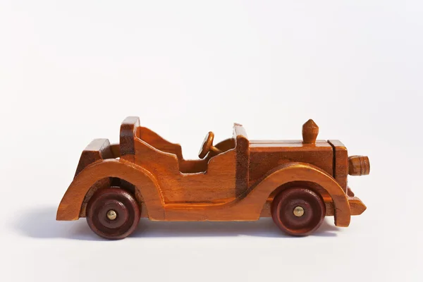 Velho carro de brinquedo de madeira — Fotografia de Stock