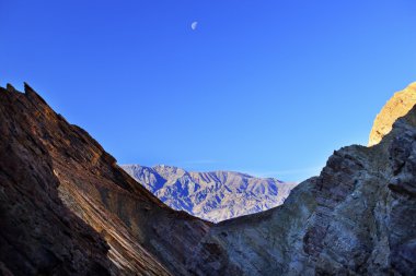 Golden Canyon Moon Death Valley National Park California clipart