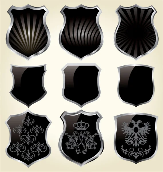 Conjunto de escudos de aço preto - isolado — Fotografia de Stock