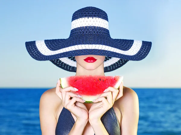 Young lady at sea with watermelon — Stock Photo, Image