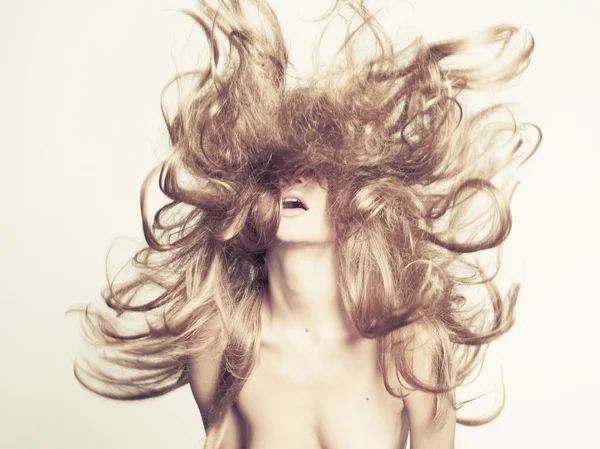 Beautiful woman with magnificent hair — Stock Photo, Image