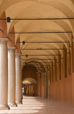 Medieval portico with columns in Bologna clipart