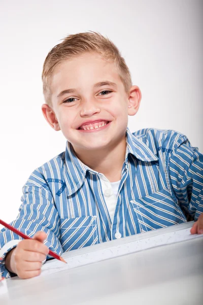 Boy with a sketch-pad — Stock Photo, Image