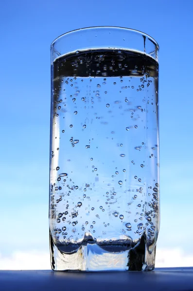 Glass with sparkling water — Stock Photo, Image