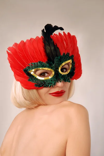 Menina em máscara vermelha — Fotografia de Stock
