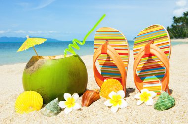 Ocean Beach with palm and exotic coctail clipart