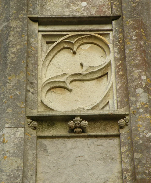 Foglie simbolo su un muro del castello — Foto Stock