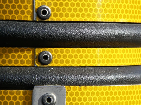 Stock image Black and yellow stripy street object, close-up