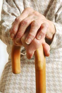 Old Ladies hands with walking stick clipart