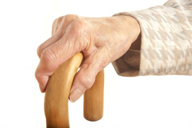 Old Ladies hand with walking stick clipart