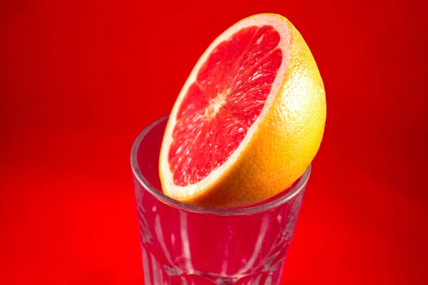 Grapefruit on top of glass — Stock Photo, Image