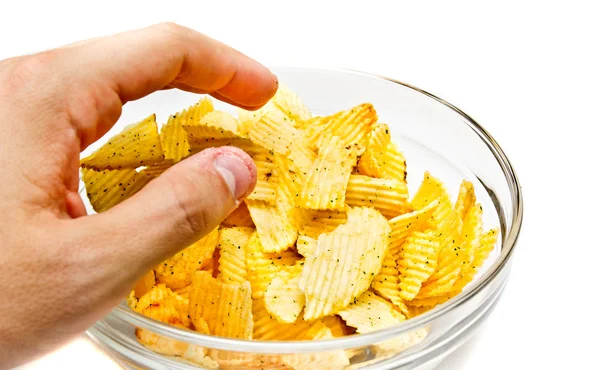 Hand greppa chips — Stockfoto