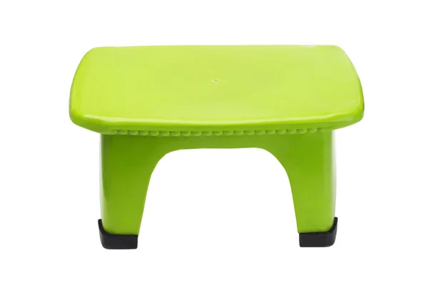 Zelená plastová stolička — Stock fotografie