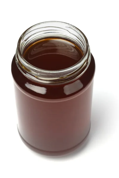 Open jar of honey — Stockfoto