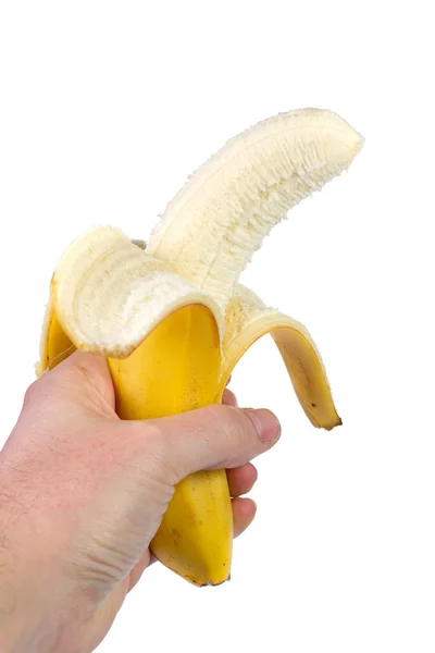 stock image Banana in the hand on white background