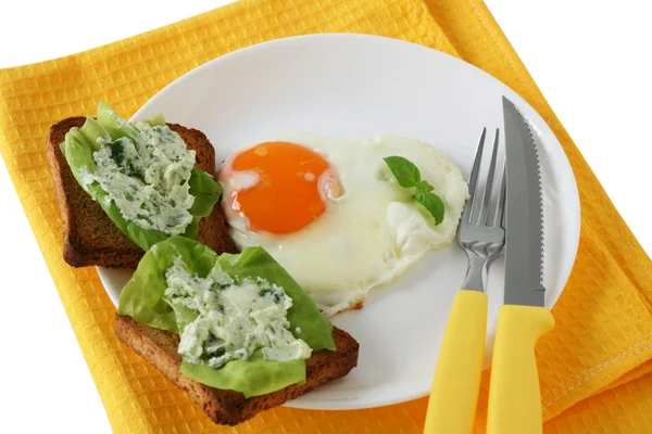 Fried egg with toasts with cream-cheese — Stock Photo, Image