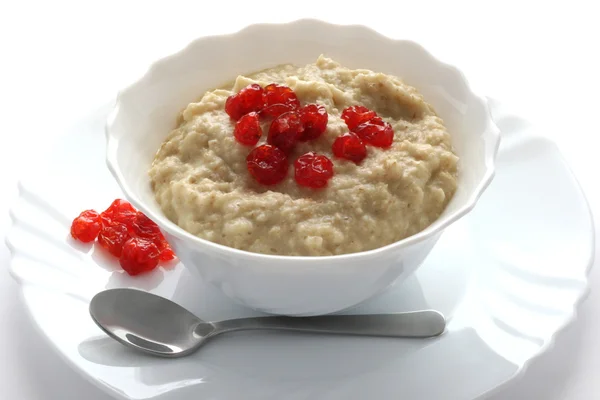 Porridge with dried cherries — Stock Photo, Image