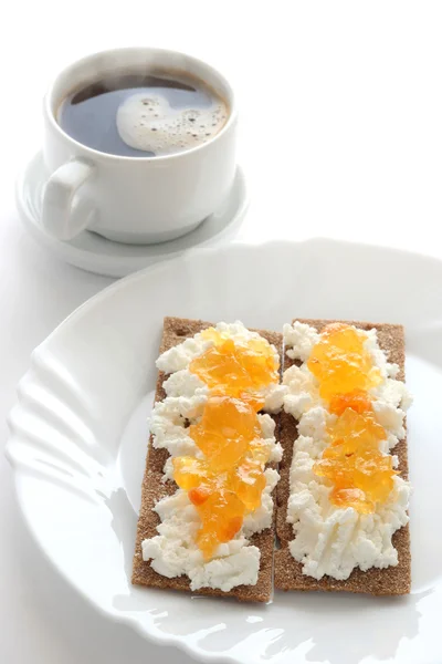 Toasts with cottage cheese and jam and coffee — Stock Photo, Image