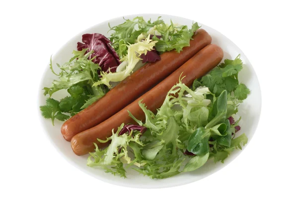 Würstchen mit Salat — Stockfoto