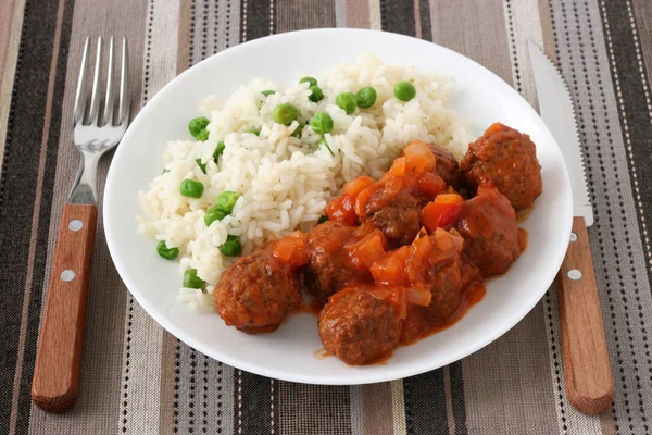 Meatballs with sauce and rice — Stock Photo, Image