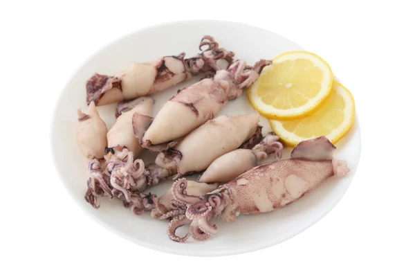 stock image Squid on plate with lemon