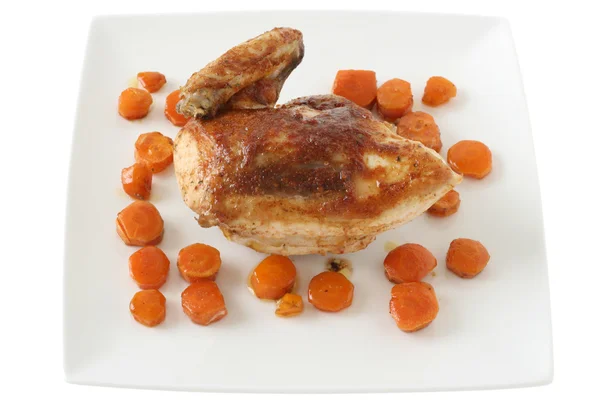 Курица с морковью — стоковое фото