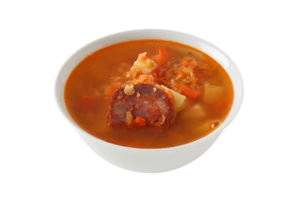 Lentil soup with sausages in an white bowl — Stock Photo, Image