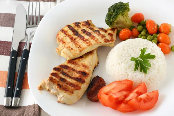Grilled pork with boiled rice and tomato — Stock Photo, Image