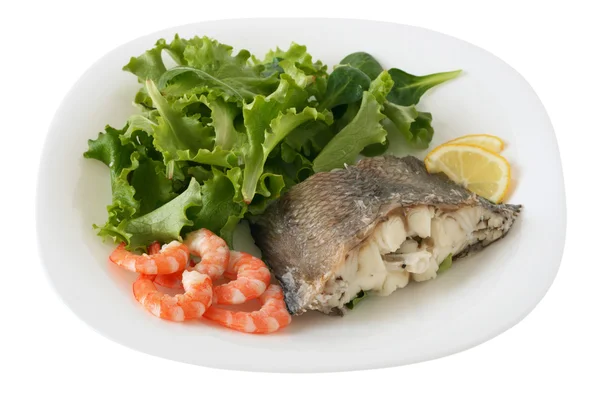 Boiled fish with shrimps, lemon and salad — Stock Photo, Image