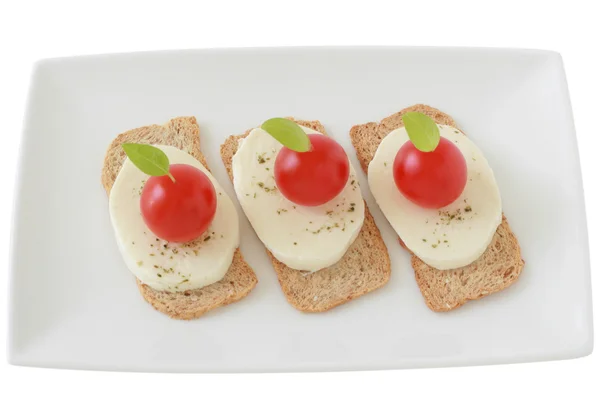 Toasts with cheese mozzarella and tomato — Stock Photo, Image
