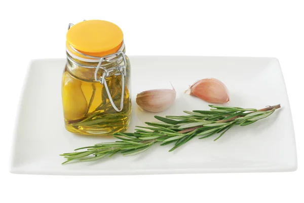 Oil with garlic and rosemary — Stock Photo, Image