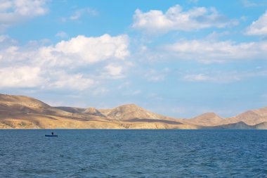 Blue sky wiht clouds and Black sea. Koktebel, Crimea, Ukraine. clipart