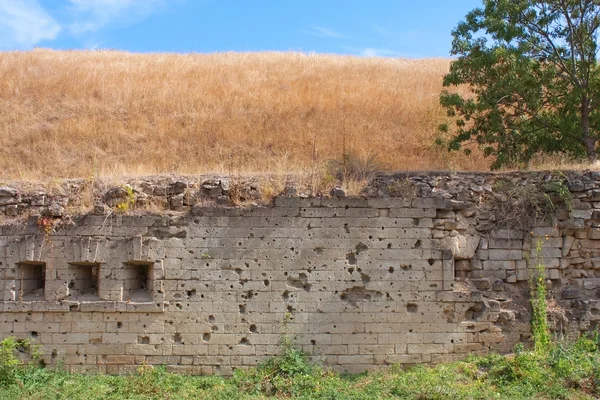 Traces of bullets on fortress wall. Kerch, Ukraine — Stock Photo, Image