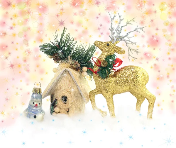 Deer, snowman and house on sparkle Christmas background — Stock Photo, Image