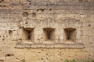 Close up of traces of bullets on fortress wall. Kerch, Ukraine clipart