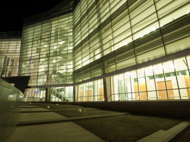 Office building at night clipart