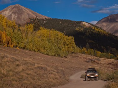 Jeep on the road clipart