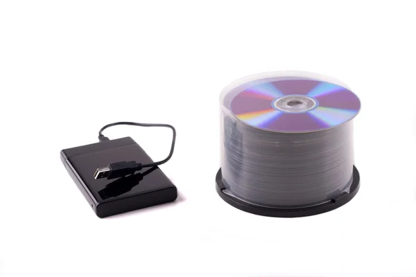 Внешний жёсткий диск и диски DVD — 图库照片