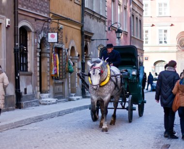 Horse and cart in Old Town. Warsaw. Poland clipart