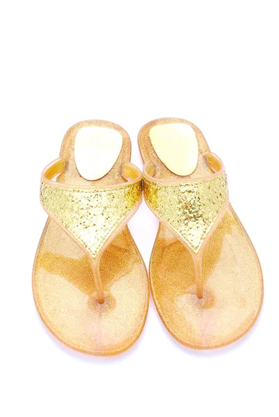 Sandálias douradas — Fotografia de Stock