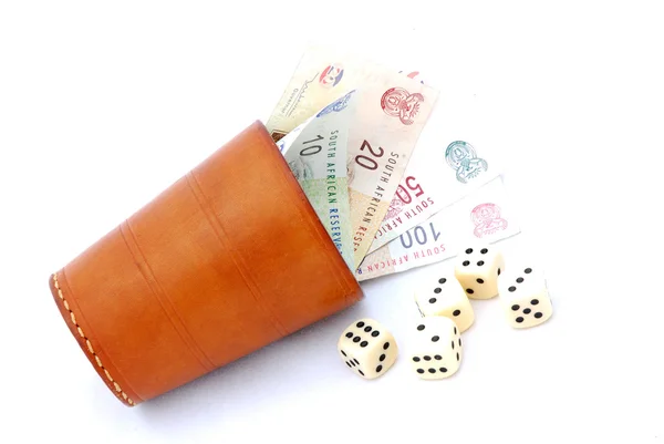 Dice cup with money — Stock Photo, Image