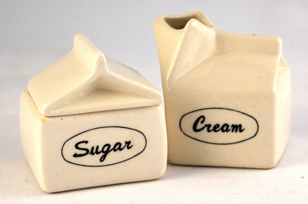 Pot met suiker en room — Stockfoto