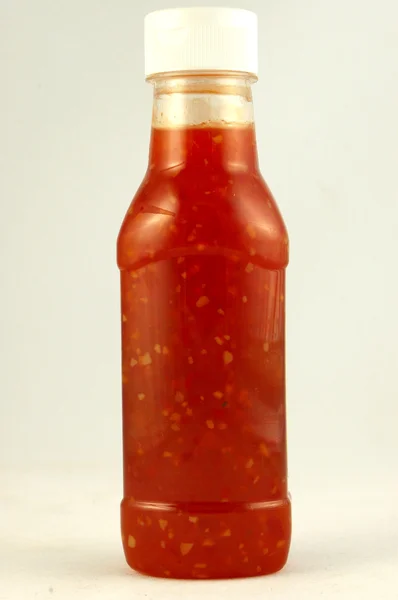 Láhev chilli omáčky — Stock fotografie