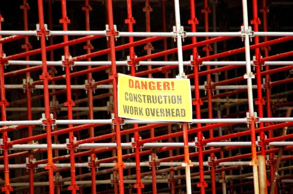 Scaffolding with danger sign — Stock Photo, Image