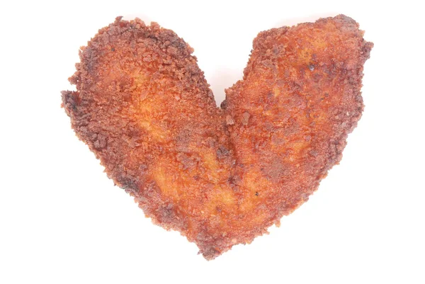 Chicken schnitzel in heart shape — Stock Photo, Image