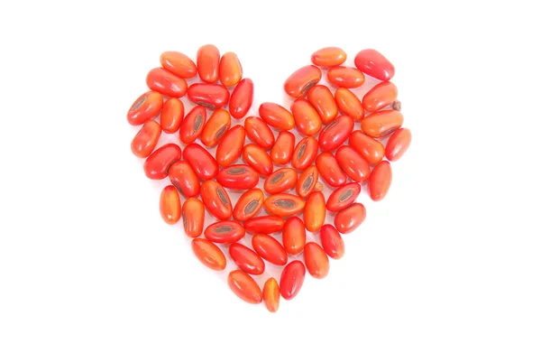 Lucky beans in heart shape — Stock Photo, Image